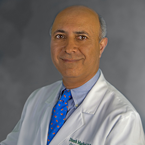 Dr. Dinesh Madhok